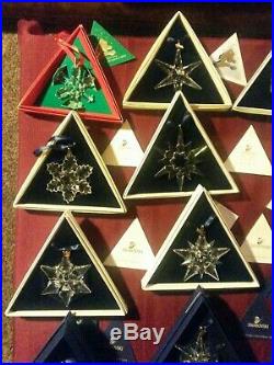 18 Annual Swarovski Crystal Christmas Ornaments 1992 thru 2009, Never Displayed