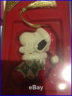 Four Snoopy Christmas ornaments Lenox China Plus One Crystal Ornament