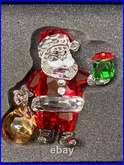 Swarovski Crystal Santa Claus with Gift Bag 5539365. New in box. Free Shipping